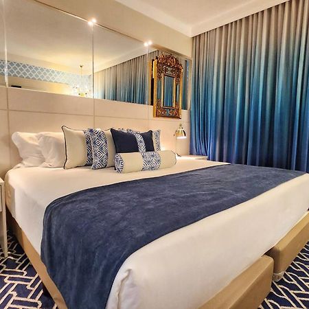 Golden Lis Hotel Boutique Goiania Bagian luar foto A bedroom at the hotel