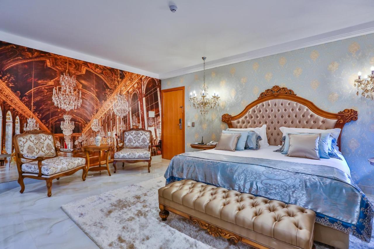 Golden Lis Hotel Boutique Goiania Bagian luar foto A bedroom in the hotel